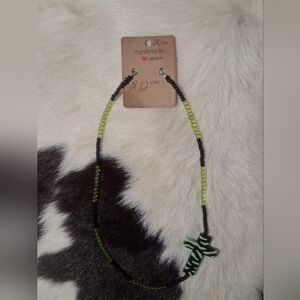 Handmade Black and Green Beaded Necklace with Cross